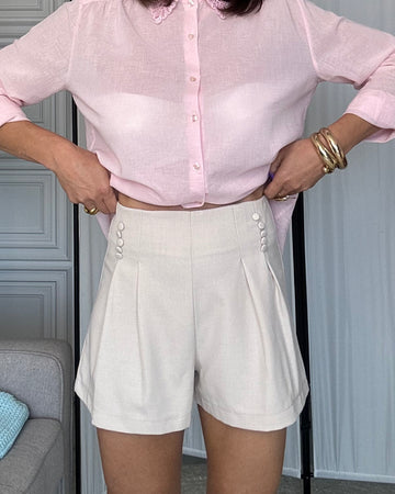 Pantaloncino gamba svasata con bottoncini strutturato beige