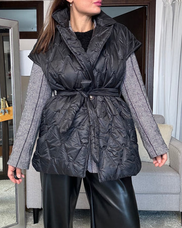 Piumino smanicato nero