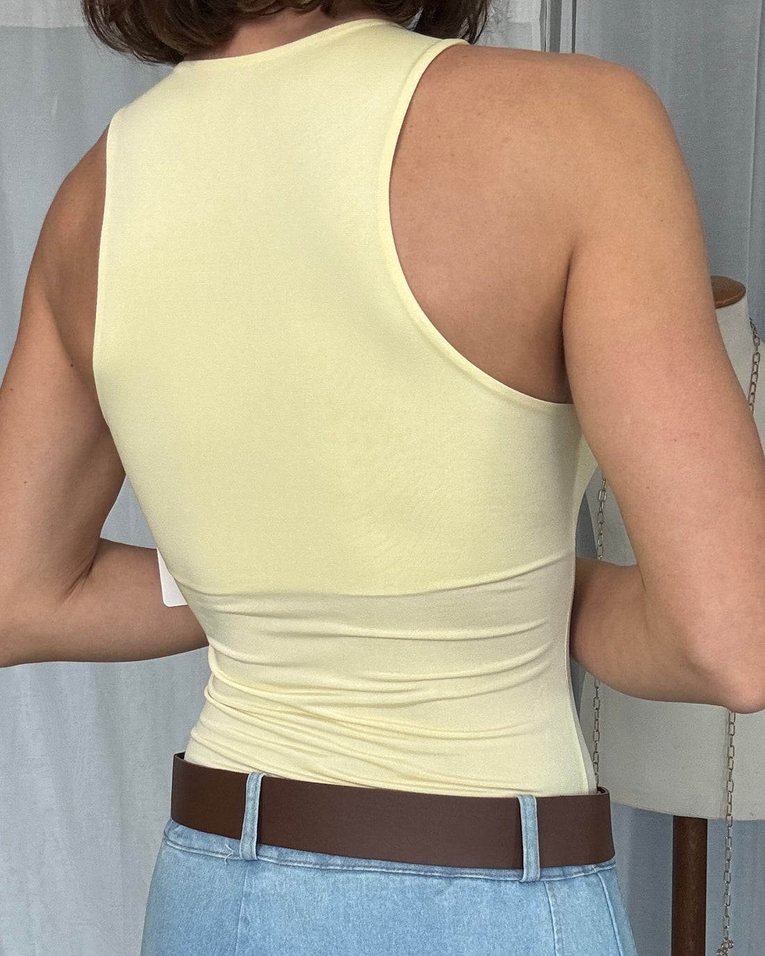 Body scollo americano lycra giallo pastello