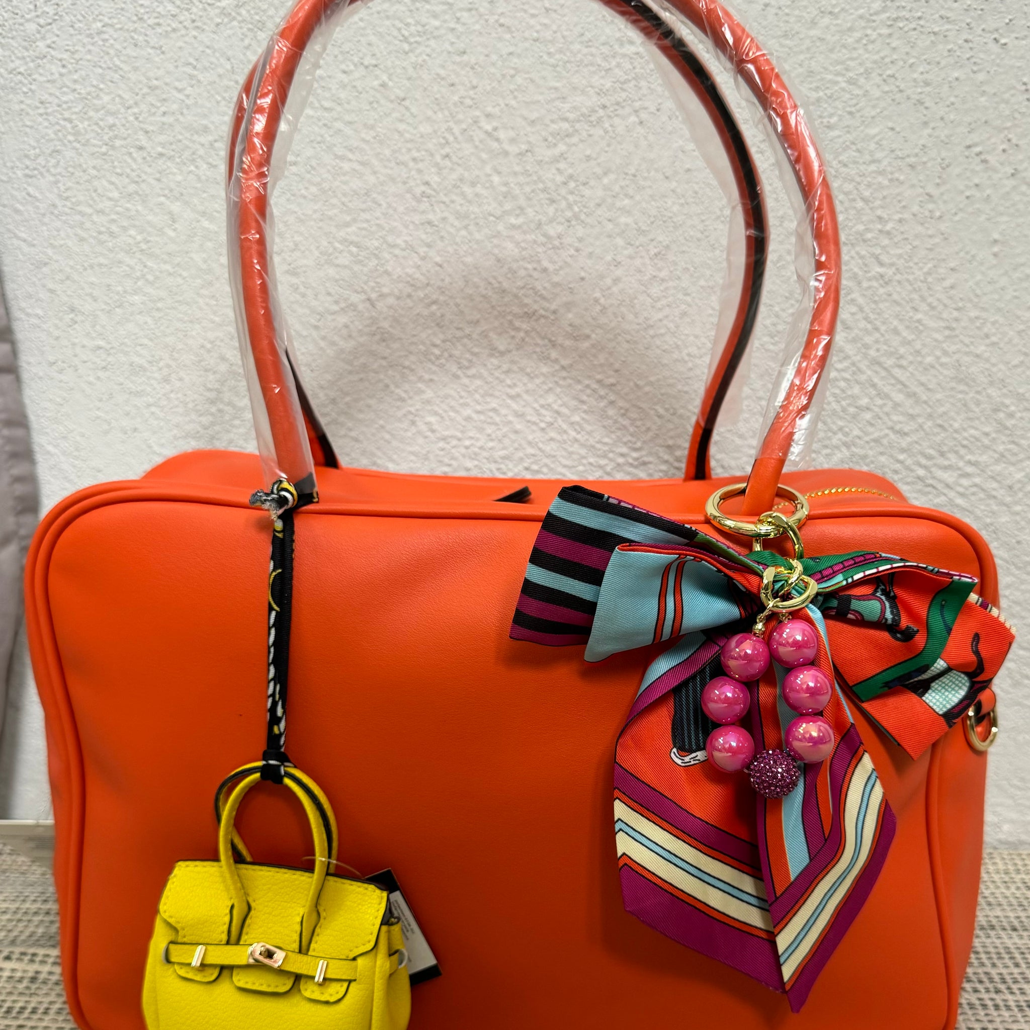 Borsa Manager orange con charme in omaggio
