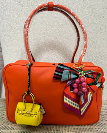 Borsa Manager orange con charme in omaggio